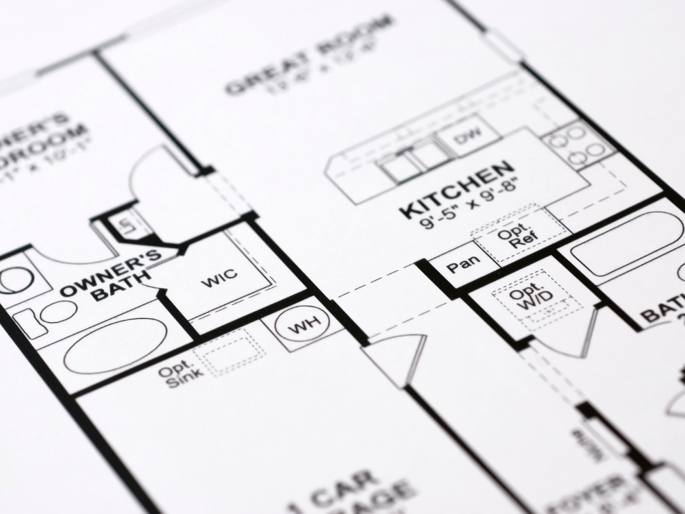 Detalhe de uma planta residencial com cozinha, banheiro e outros ambientes para avaliação do projeto do imóvel